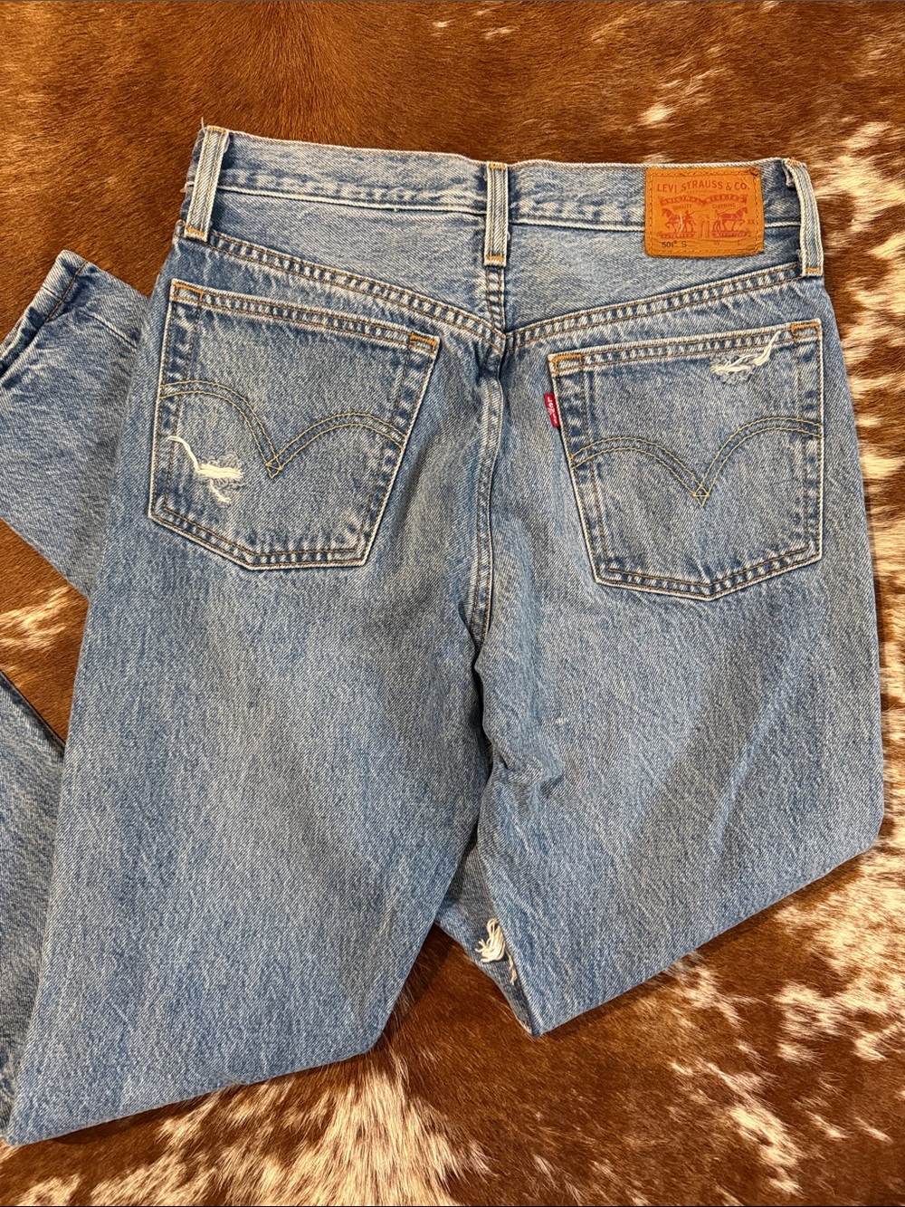 Levi's Light Blue Straight Leg Jeans with Signature Back Pockets